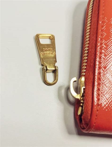 prada zipper pull replacement.